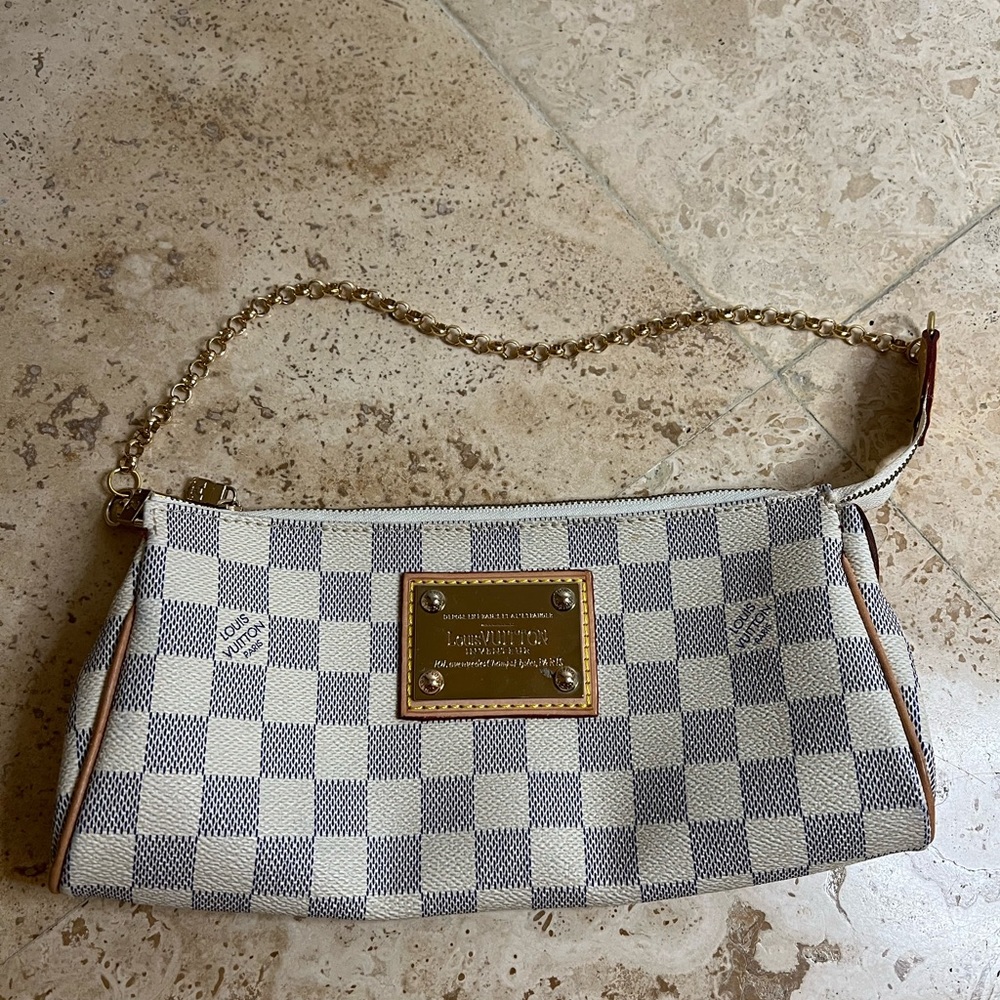 Louis Vuitton
Eva Damier Azur Clutch
10"L x 2"W x 5"H